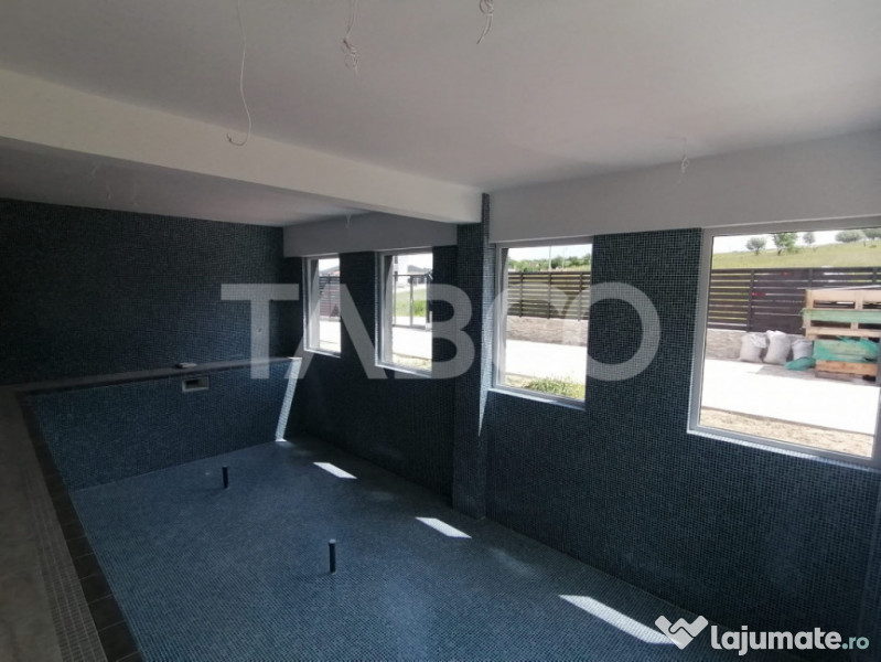 Casa moderna de inchiriat 5 camere cu teren si piscina Cisna