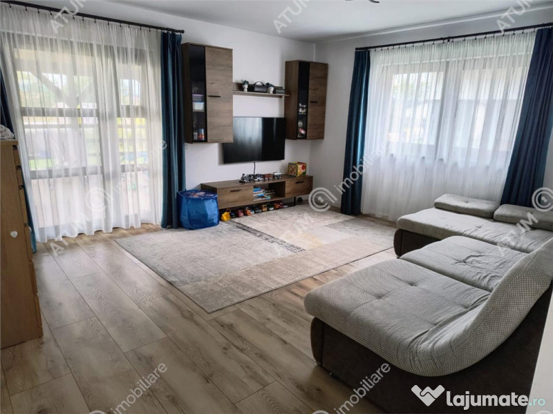 Casa individuala cu 4 camere terasa si teren 500 mp in Sura 