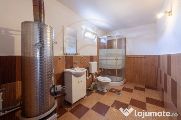 Casa cu teren generos si gradina spectaculoasa – Comuna Cu 