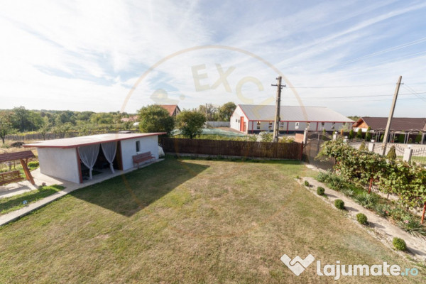 Casa cu teren generos si gradina spectaculoasa – Comuna Cu 