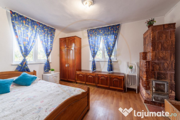 Casa cu teren generos si gradina spectaculoasa – Comuna Cu 