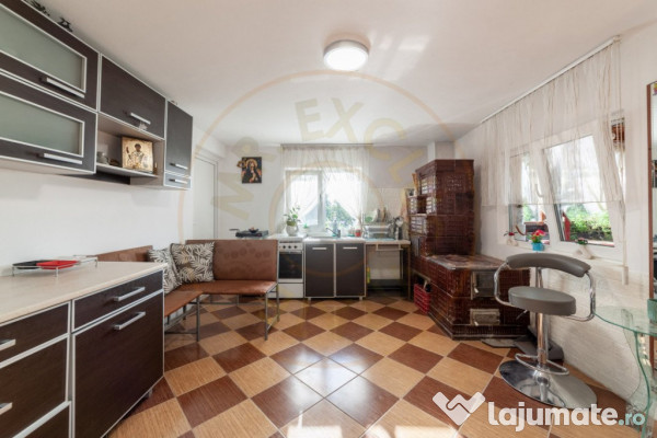 Casa cu teren generos si gradina spectaculoasa – Comuna Cu 