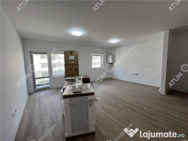 Apartament cu 3 camere 2 bai si balcon etaj 1 zona Doamna St 