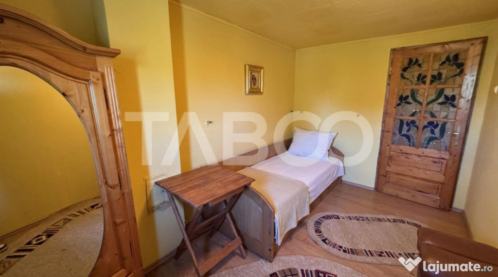 Casa de vanzare 6 camere loc de relaxare garaj teren 669 mp
