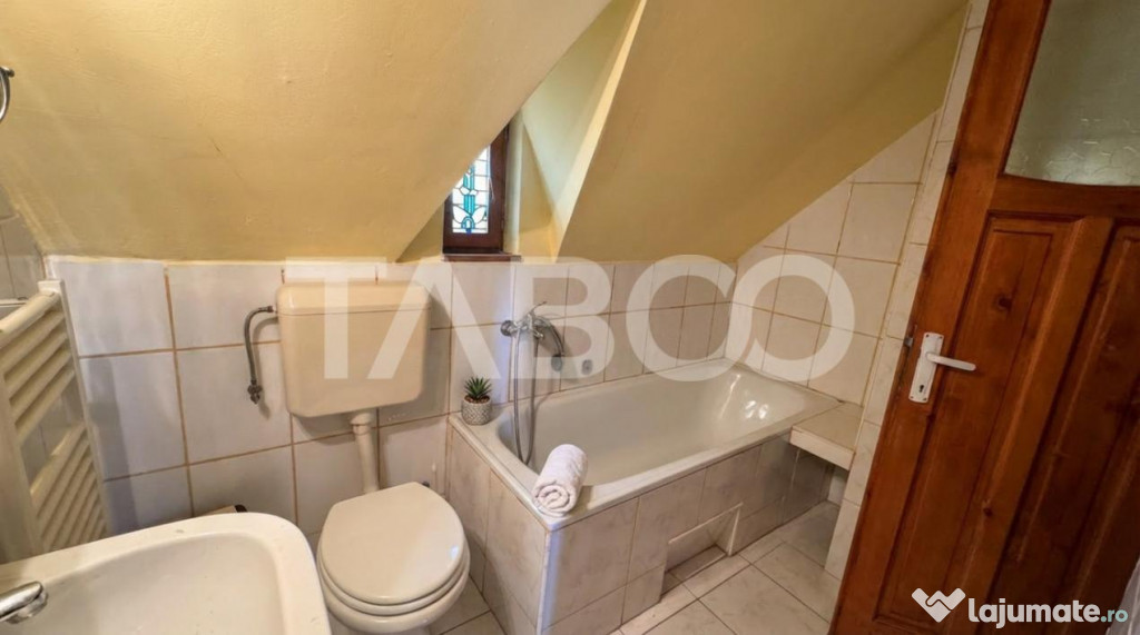 Casa de vanzare 6 camere loc de relaxare garaj teren 669 mp