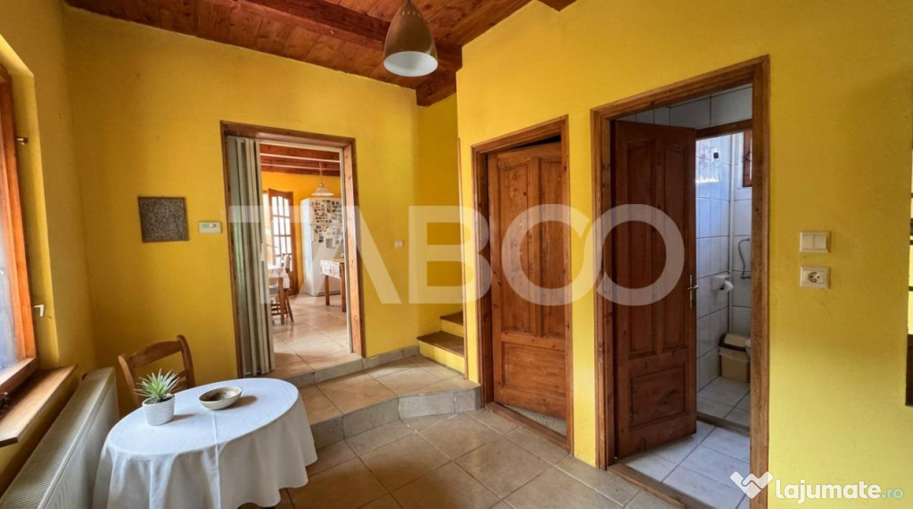 Casa de vanzare 6 camere loc de relaxare garaj teren 669 mp