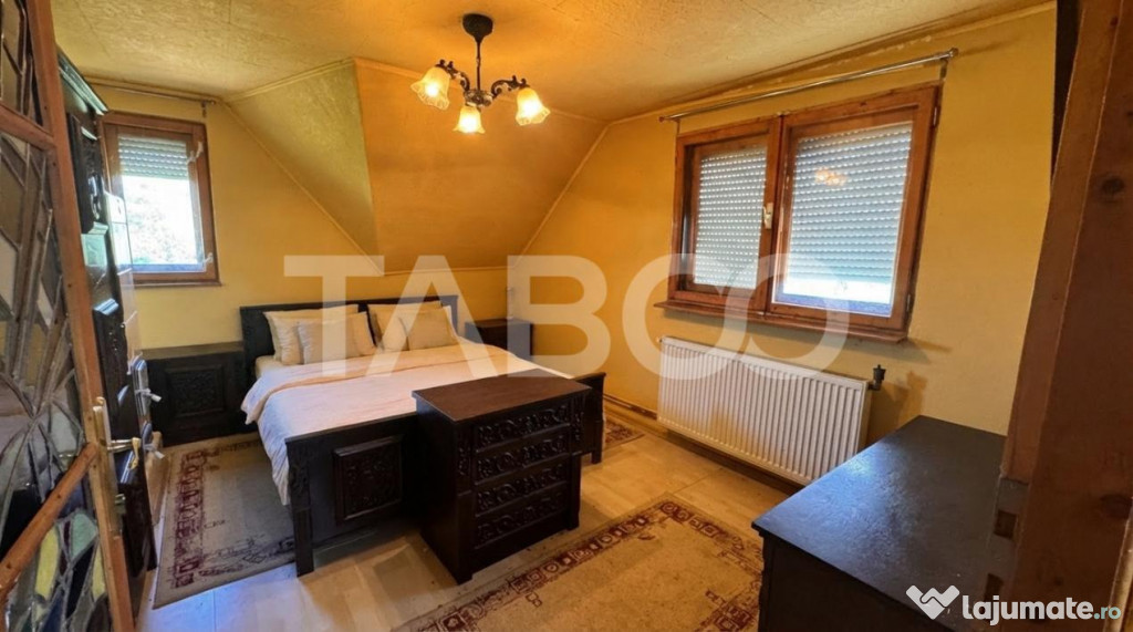Casa de vanzare 6 camere loc de relaxare garaj teren 669 mp