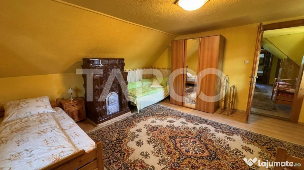 Casa de vanzare 6 camere loc de relaxare garaj teren 669 mp
