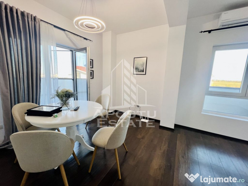 Apartament cu trei camere , decomandat , cu terasa ,in Giroc 