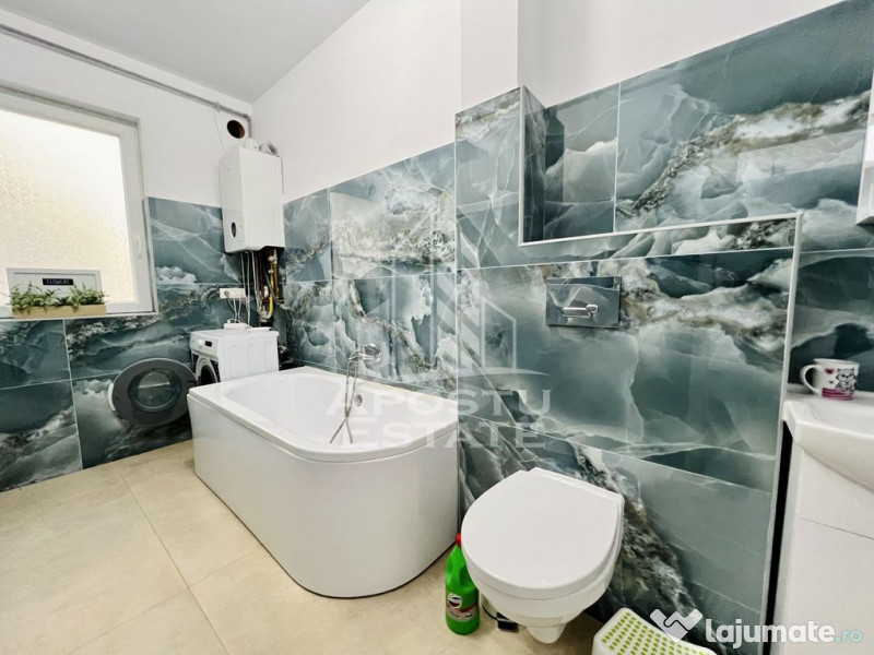 Apartament cu trei camere , decomandat , cu terasa ,in Giroc 