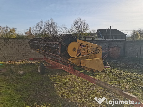 Combina agricola New Holland tx 66 