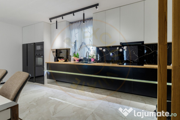 Casă superbă pe parter cu piscină, foișor și 1.000 mp t 