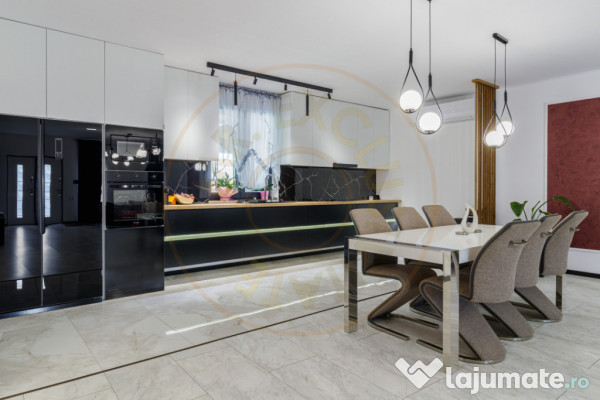 Casă superbă pe parter cu piscină, foișor și 1.000 mp t 