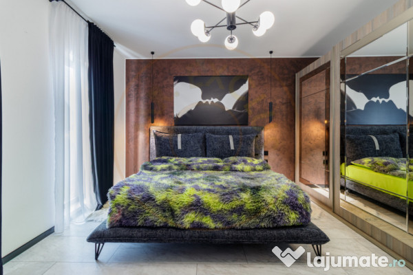 Casă superbă pe parter cu piscină, foișor și 1.000 mp t 