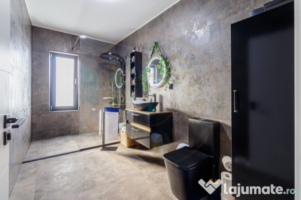 Casă superbă pe parter cu piscină, foișor și 1.000 mp t 