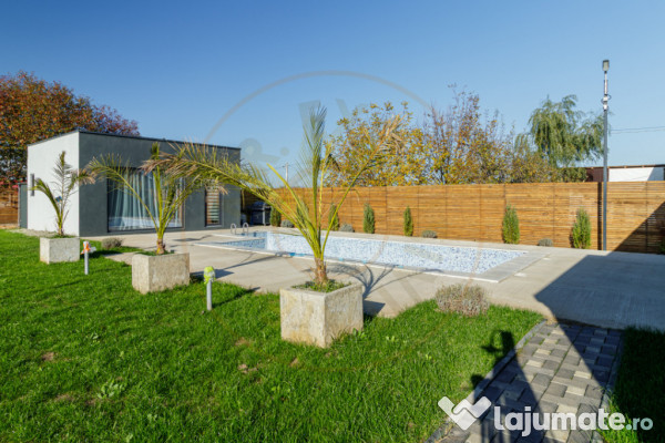 Casă superbă pe parter cu piscină, foișor și 1.000 mp t 
